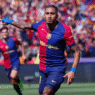 Barcelona players celebrating after a dramatic 4-3 El Clasico win over Real Madrid at Lluis Companys Olympic Stadium.