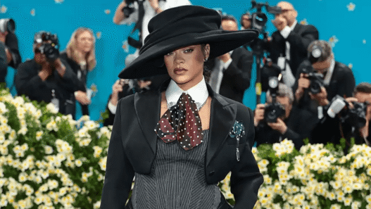 Kim Kardashian wearing leather Chrome Hearts two-piece with pearls at 2025 Met Gala