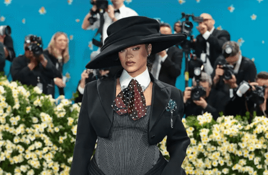 Kim Kardashian wearing leather Chrome Hearts two-piece with pearls at 2025 Met Gala