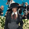 Kim Kardashian wearing leather Chrome Hearts two-piece with pearls at 2025 Met Gala