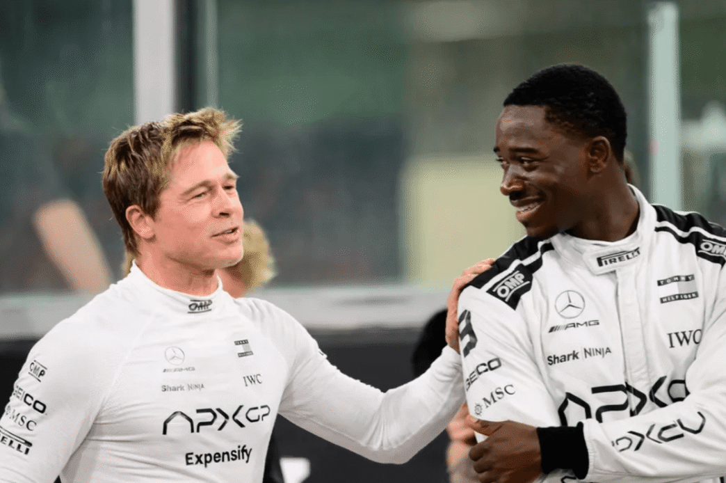 Damson Idris revealing Tommy Hilfiger tuxedo under F1 racing suit at 2025 Met Gala