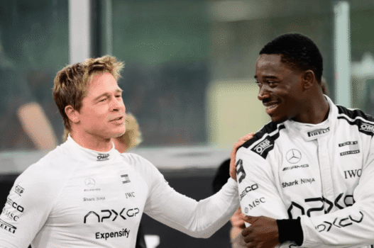 Damson Idris revealing Tommy Hilfiger tuxedo under F1 racing suit at 2025 Met Gala