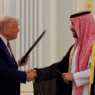 Donald Trump and Crown Prince Mohammed bin Salman shake hands in Riyadh after announcing a $600B U.S.-Saudi investment and arms agreement.