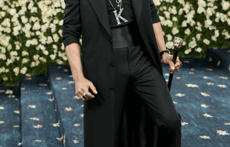 Shah Rukh Khan wearing black Sabyasachi coat at 2025 Met Gala with accessories