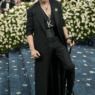 Shah Rukh Khan wearing black Sabyasachi coat at 2025 Met Gala with accessories