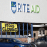 Rite Aid storefront with closing signs in windows amid bankruptcy announcement