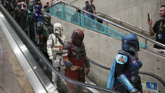 Stormtroopers and fans dressed in Star Wars costumes celebrating May the 4th, also known as Star Wars Day.