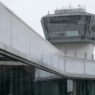Newark Liberty International Airport control tower and aircraft during flight delays