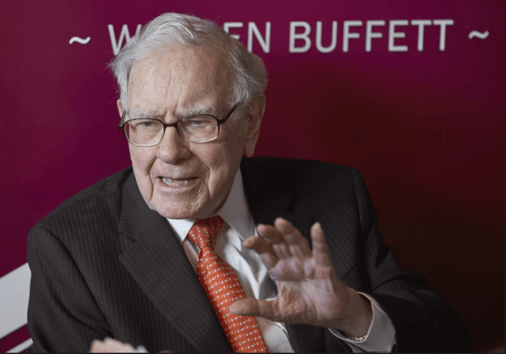 Buffett with Greg Abel at shareholder meeting.